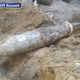 The bomb time capsule discovered yesterday in New York by crews digging up the street (Screenshot from CBS2 via Cliff Russell)
